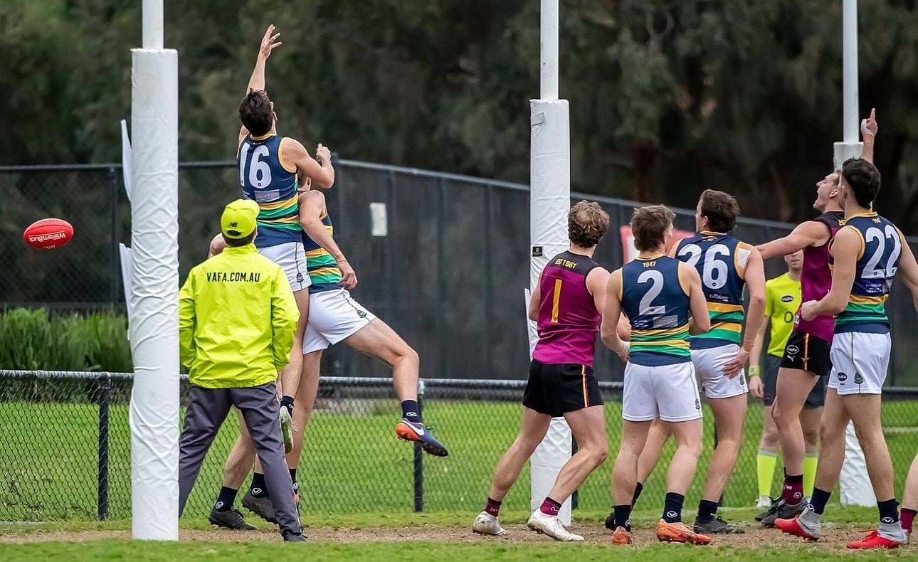 Bailey Yates at right celebrates the Bloods first goal early in the game, Joel Chilcott (1) watches on; goals were hard to find after this bright beginning