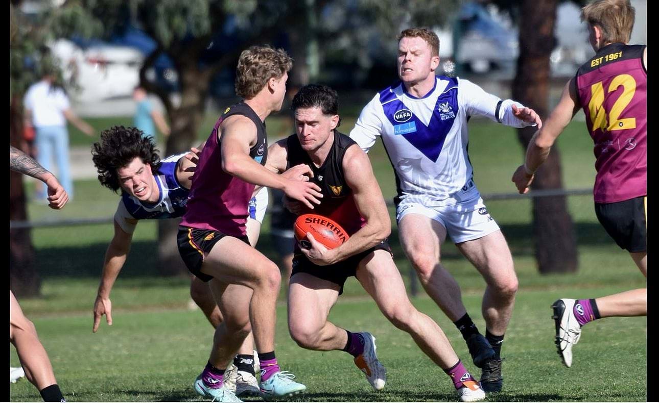 Skipper Brede Seccull bursts through the pack, Hugo Nosiara and Charlie Harrop (42) on hand to help