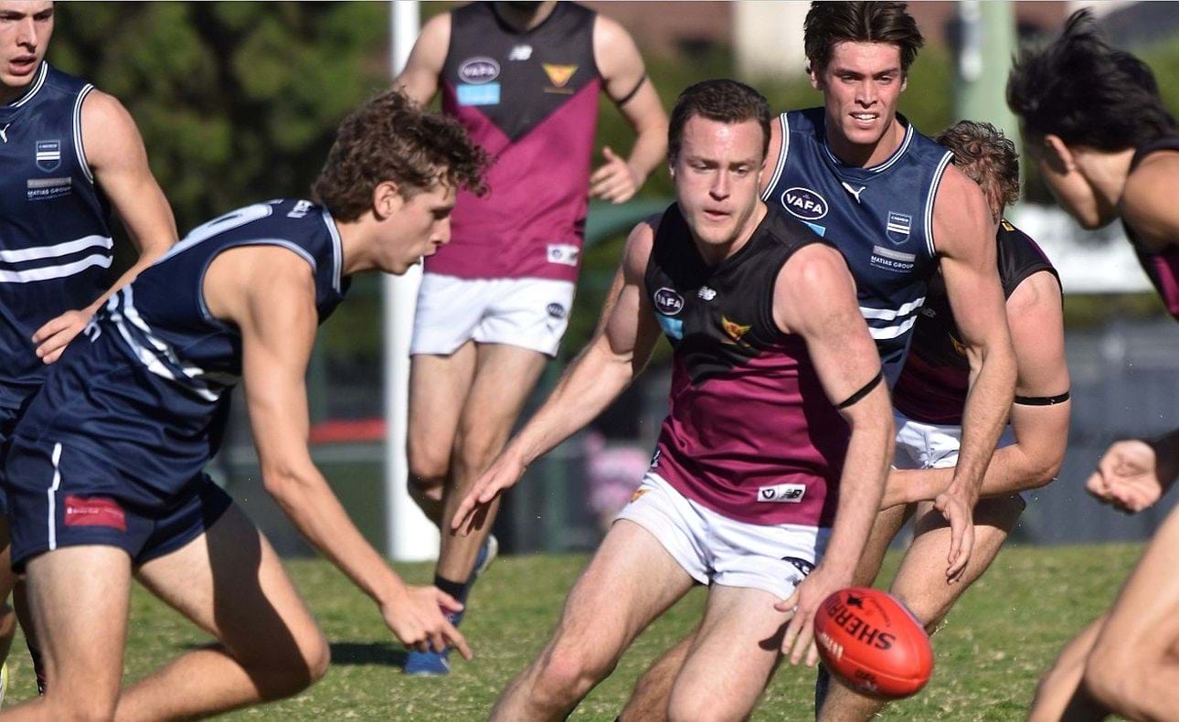 Max Sievers leads the chase for the ball