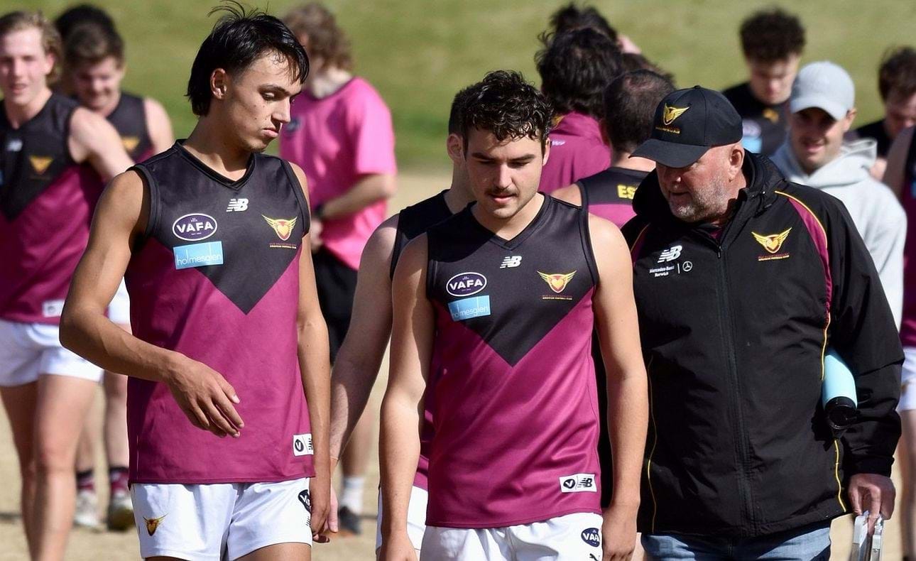 Jack Kennedy, Liam Riedel and coach David Connell at the end of the Reserves match