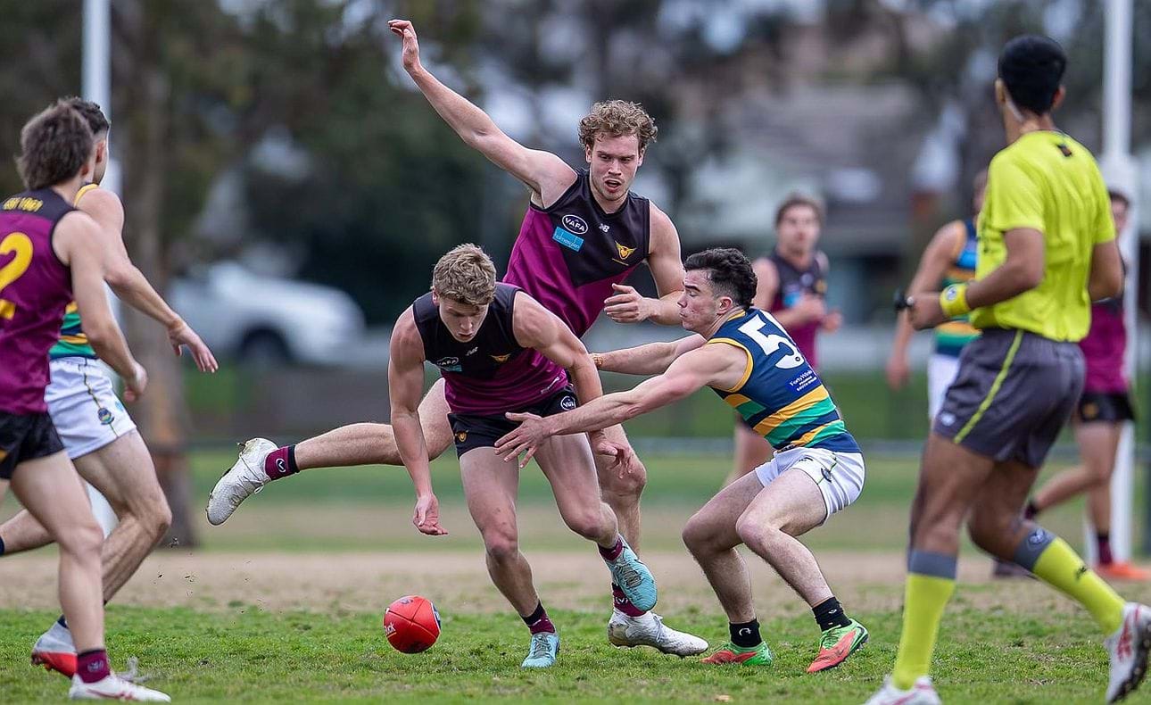 Hugo Nosiara in front, Joel Chilcott stretches his wings behind