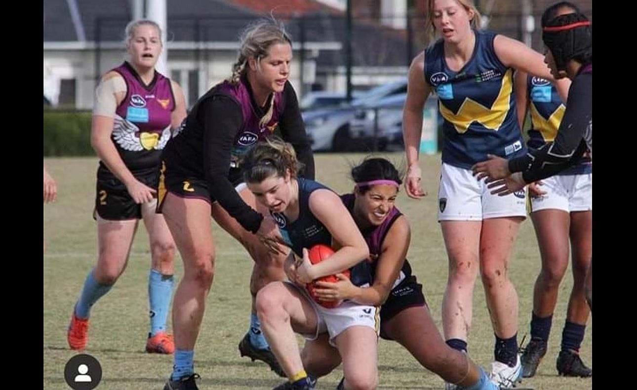 Action in the Hearts' Round 6 clash against Whitefriars