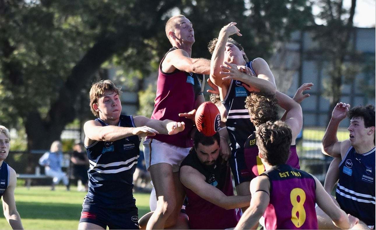 Bailey Yates flies over the top of the pack that includes team mates Jack Bell, Joel Chilcott (1) and Noah Higgins (8)
