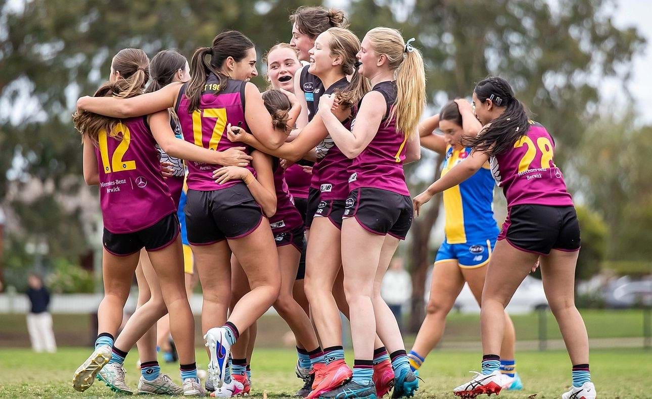 The rest of the team joins in the celebrations