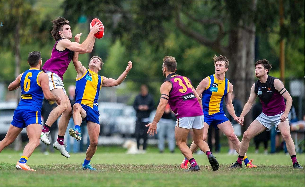 Gaspa's grab - Josh Gasparini marks in front of team mate Rohan Heasley (34)