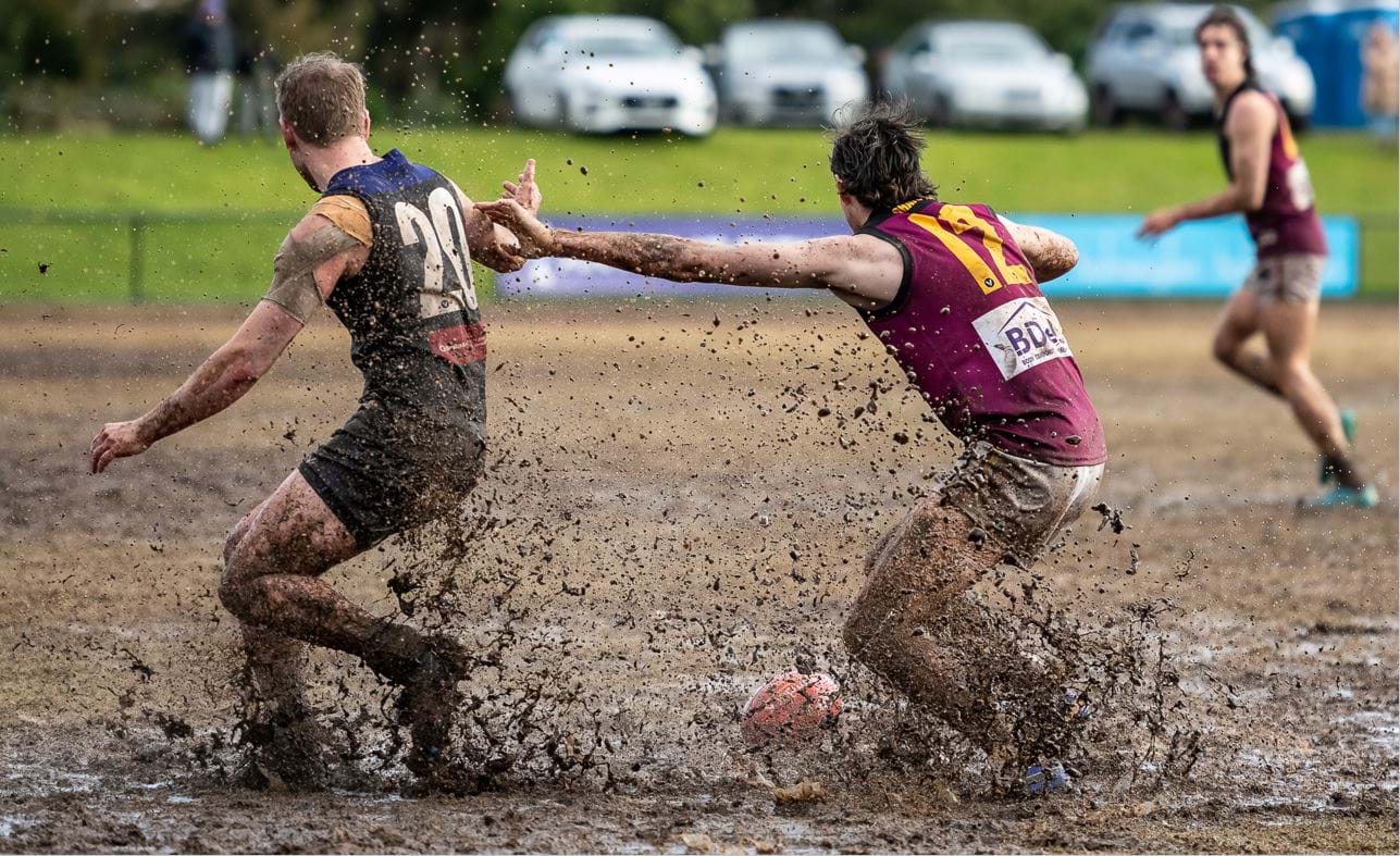 Kye Turner (12) swivels in the mud