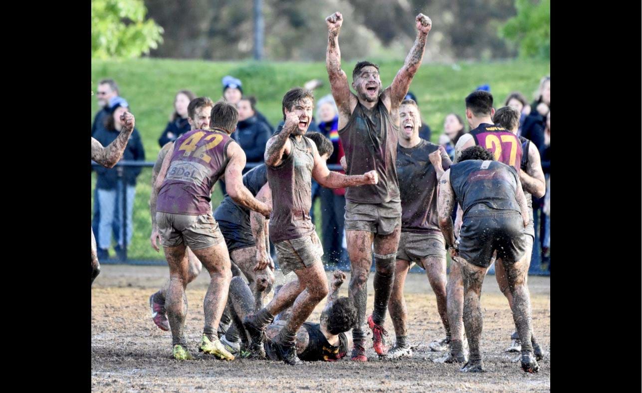Brede Seccull, Jack Munro and Jack Lonie roar with delight at the sound of the final siren