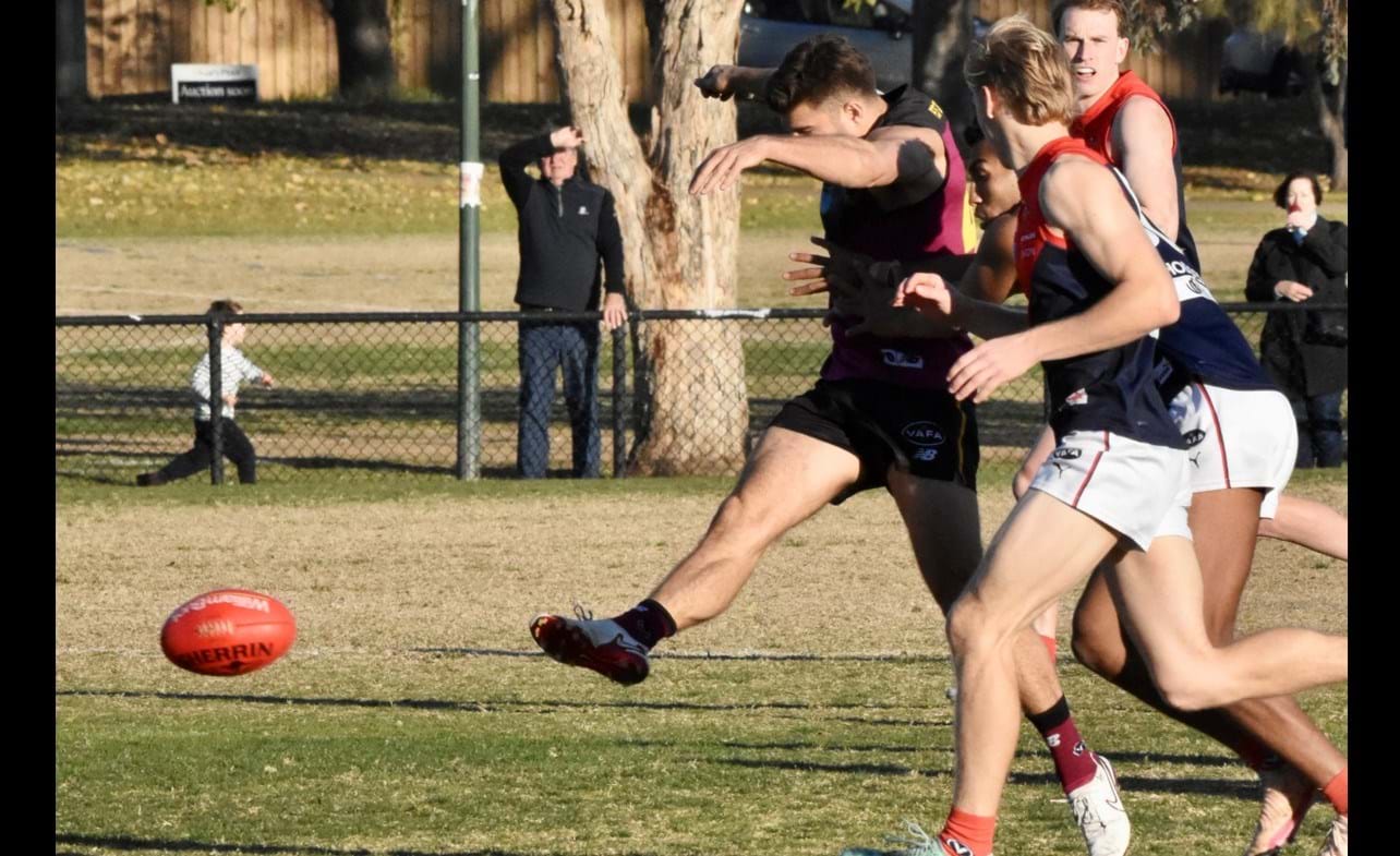 Connor Riley kicks under pressure