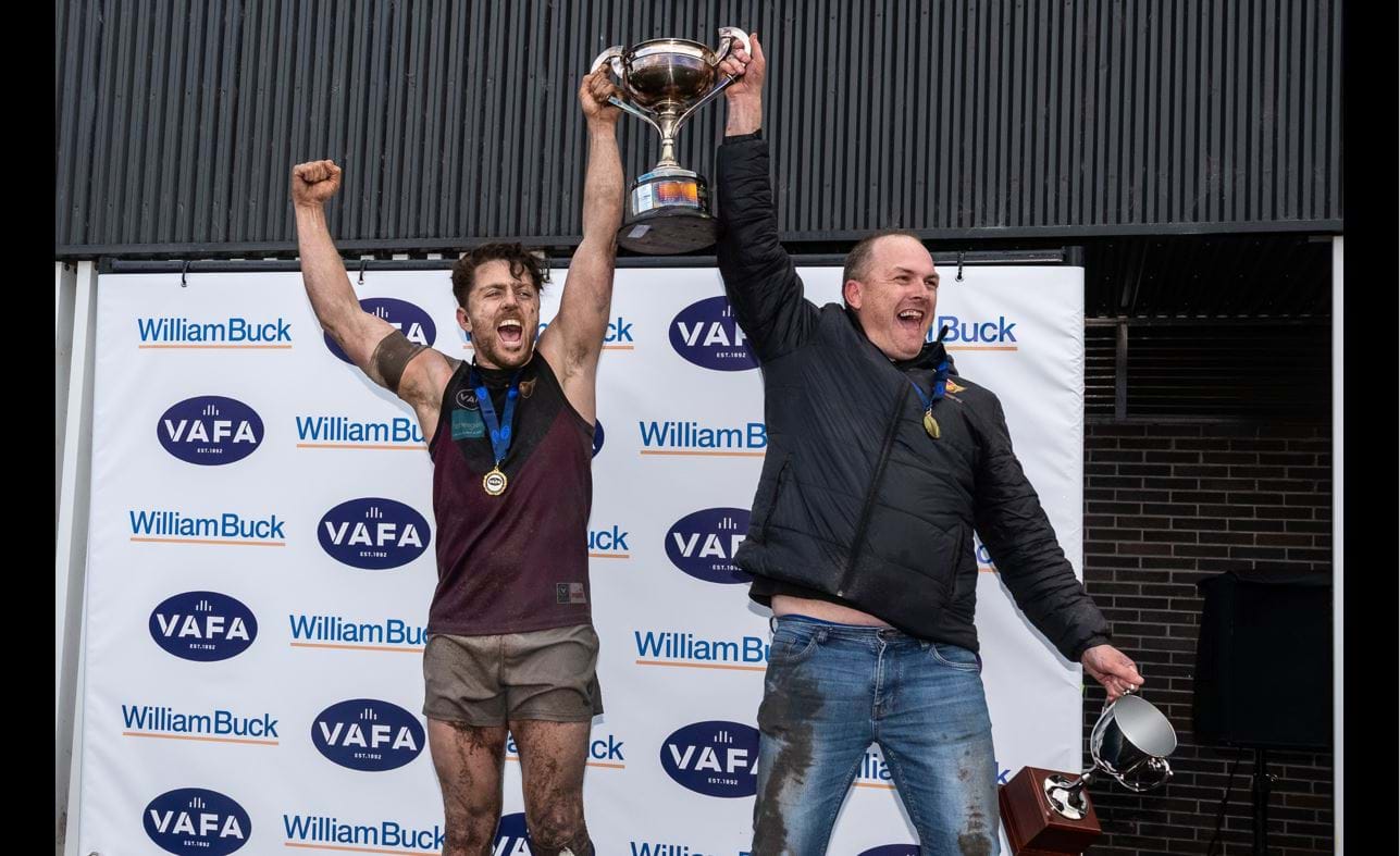 Captain and coach lift the premiership cup