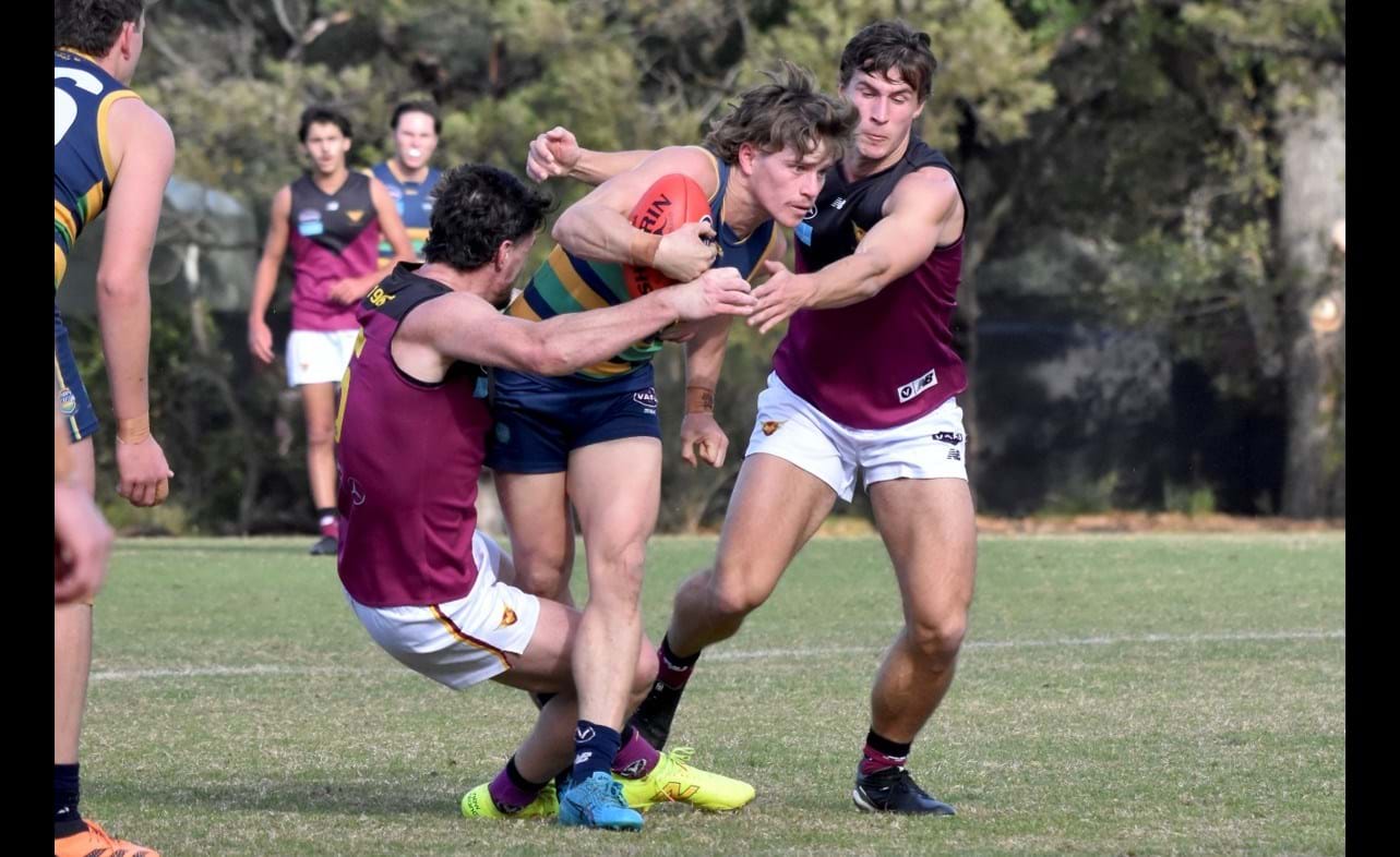 There was no breaking the tag team tackle of centre bounce duo Brede Seccull and Lachie Riley