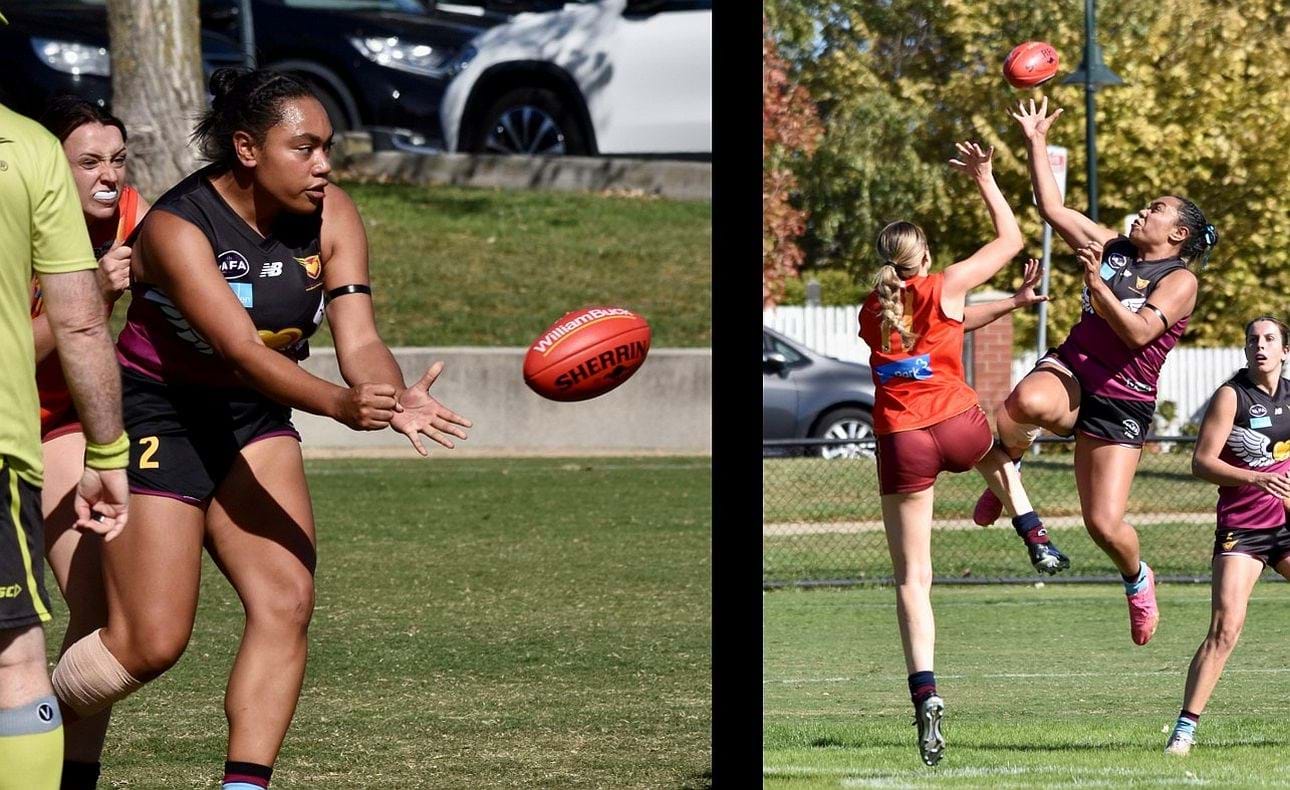 Serene Vudiniabola handballing and contesting in the ruck