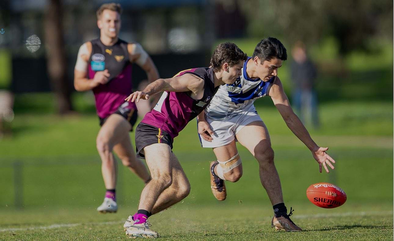 Charlie Sinclair over the ball