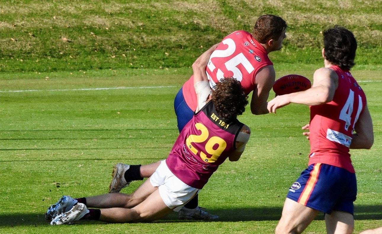 A sprawling tackle from Will Paul