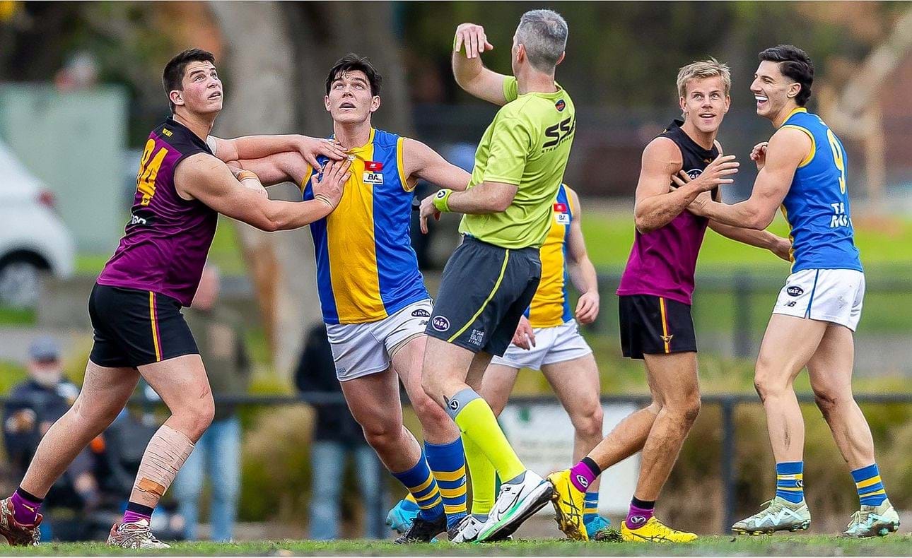 Debutant ruckman Ethan Hardeman competes a ball-up, Mattias Rose watching on