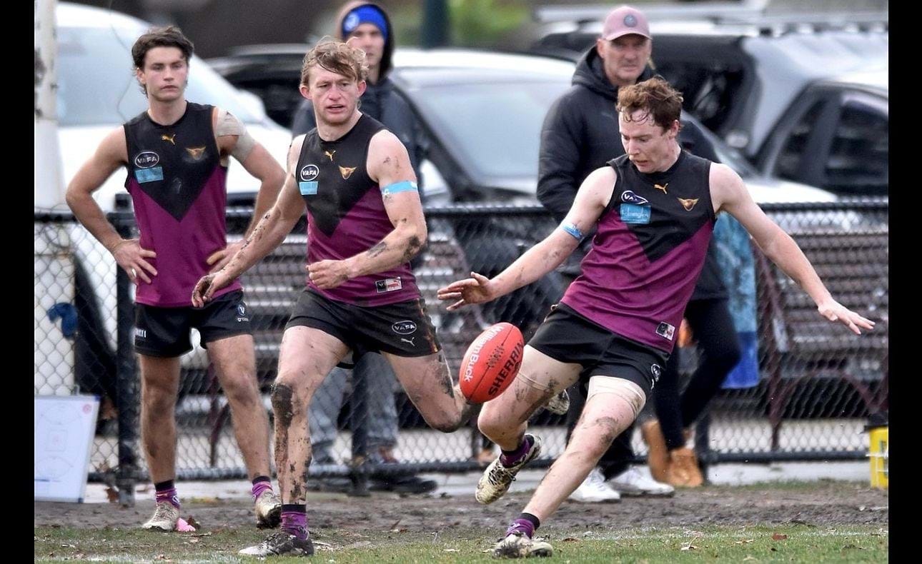 Seve Stefanakis on senior debut takes his kick watched by Charlie Sinclair, Rayner Seccull and Reserves coach Jeremy Bourke