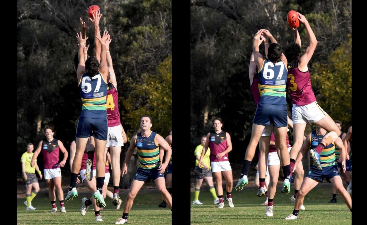 Jack Bell emerges with the longest arms to mark in front of Durras Seccull (14) and a St Kevin's opponent