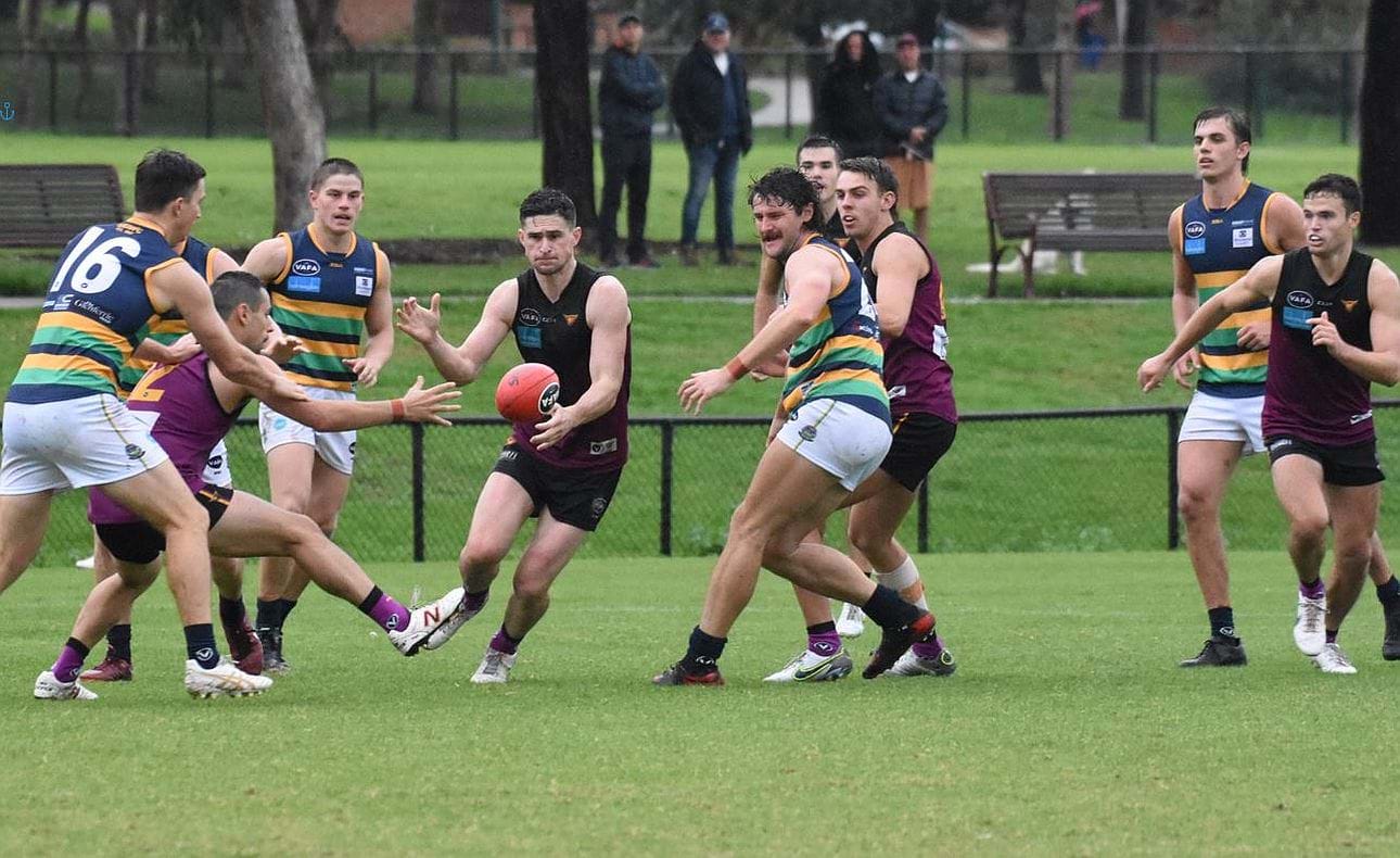 Brede Seccull surrounded by team mates and opponents