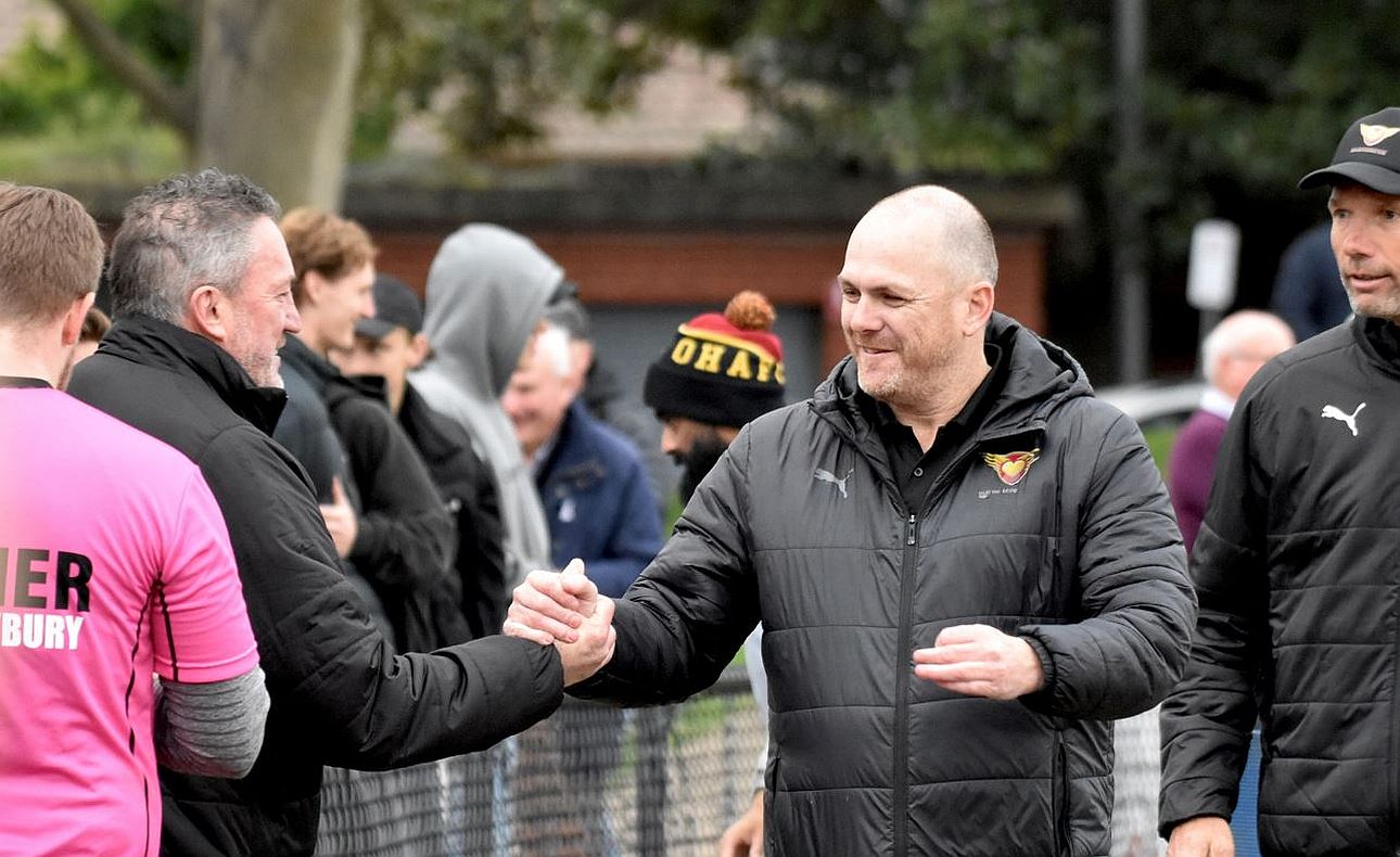 Happy coach Daniel Ward after the game