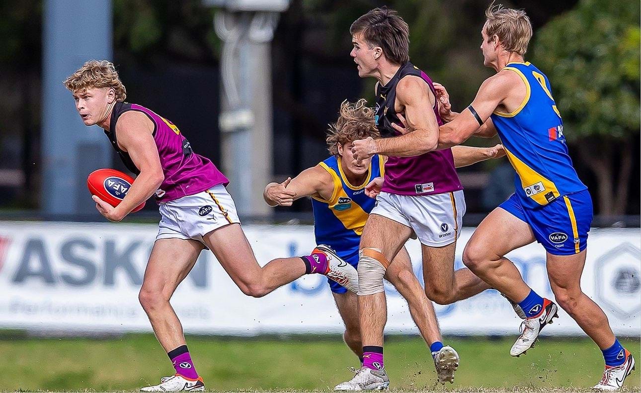 Hugo Nosiara on the run again, Josh Gasparini nearby