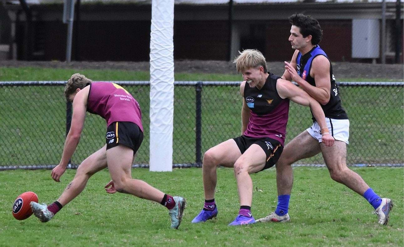 Hugo Nosiara collects a ground ball, protected by Charlie Harrop's shepherd