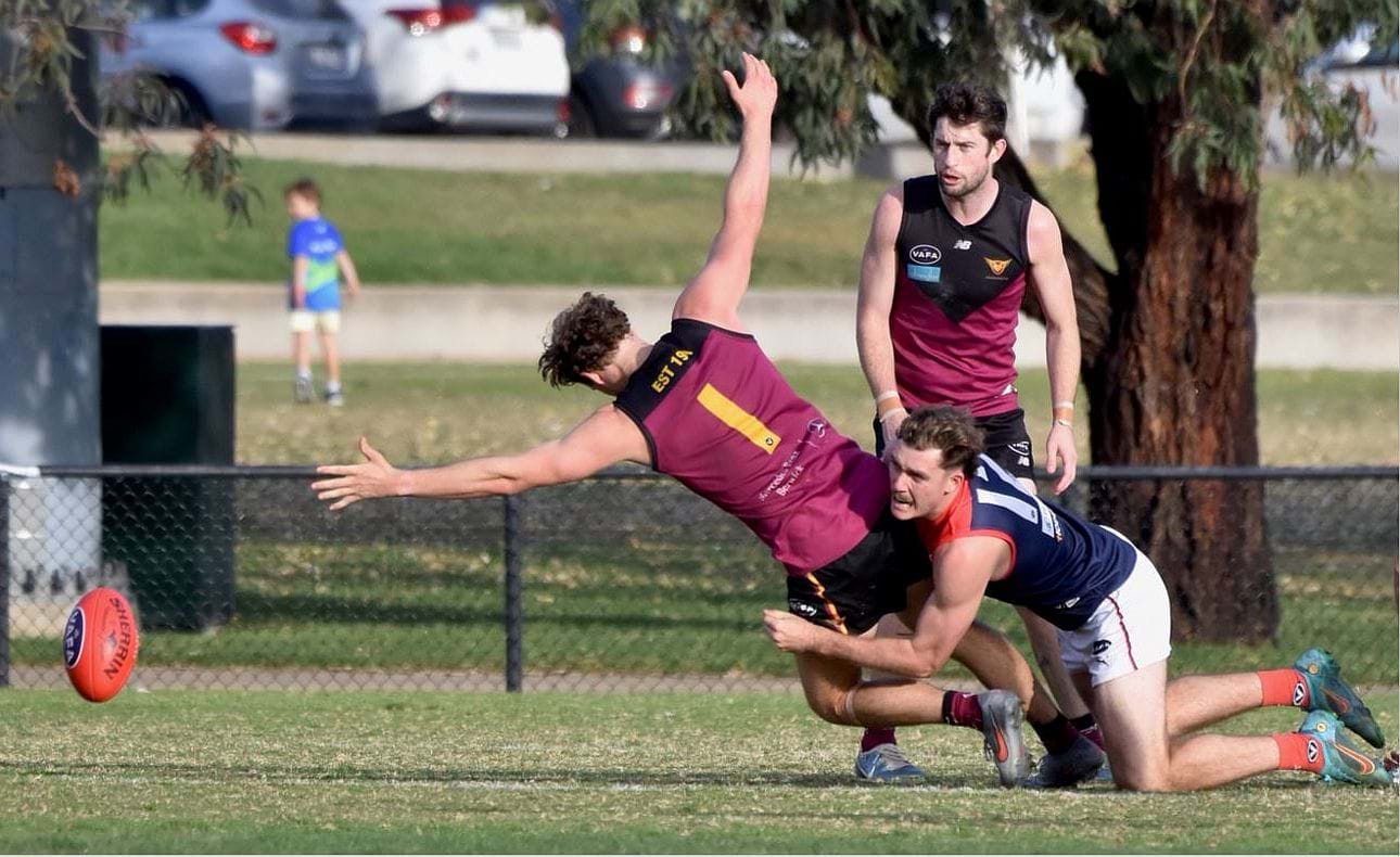 Holding the man!  In this case Joel Chilcott (1)