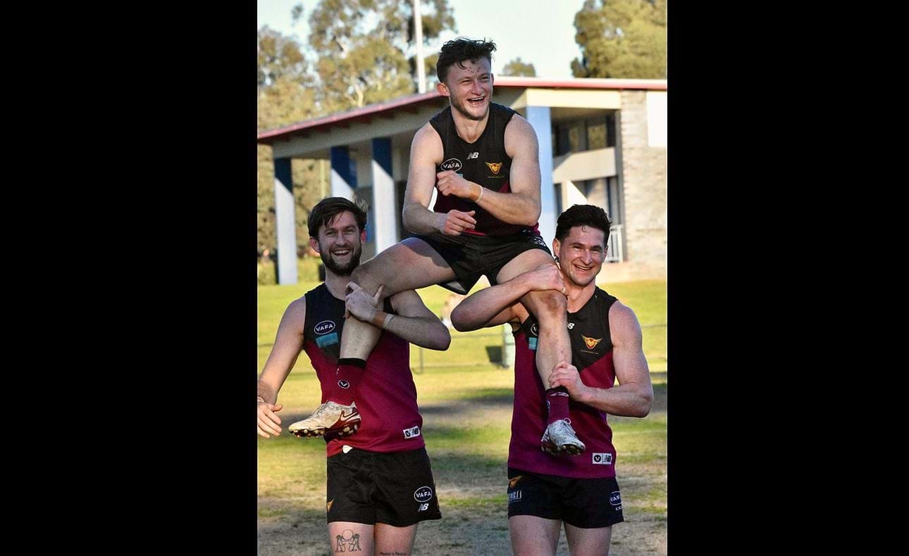 Happy ending for the Seccull brothers with Durras and Brede carrying younger brother Rayner off after his 150th game