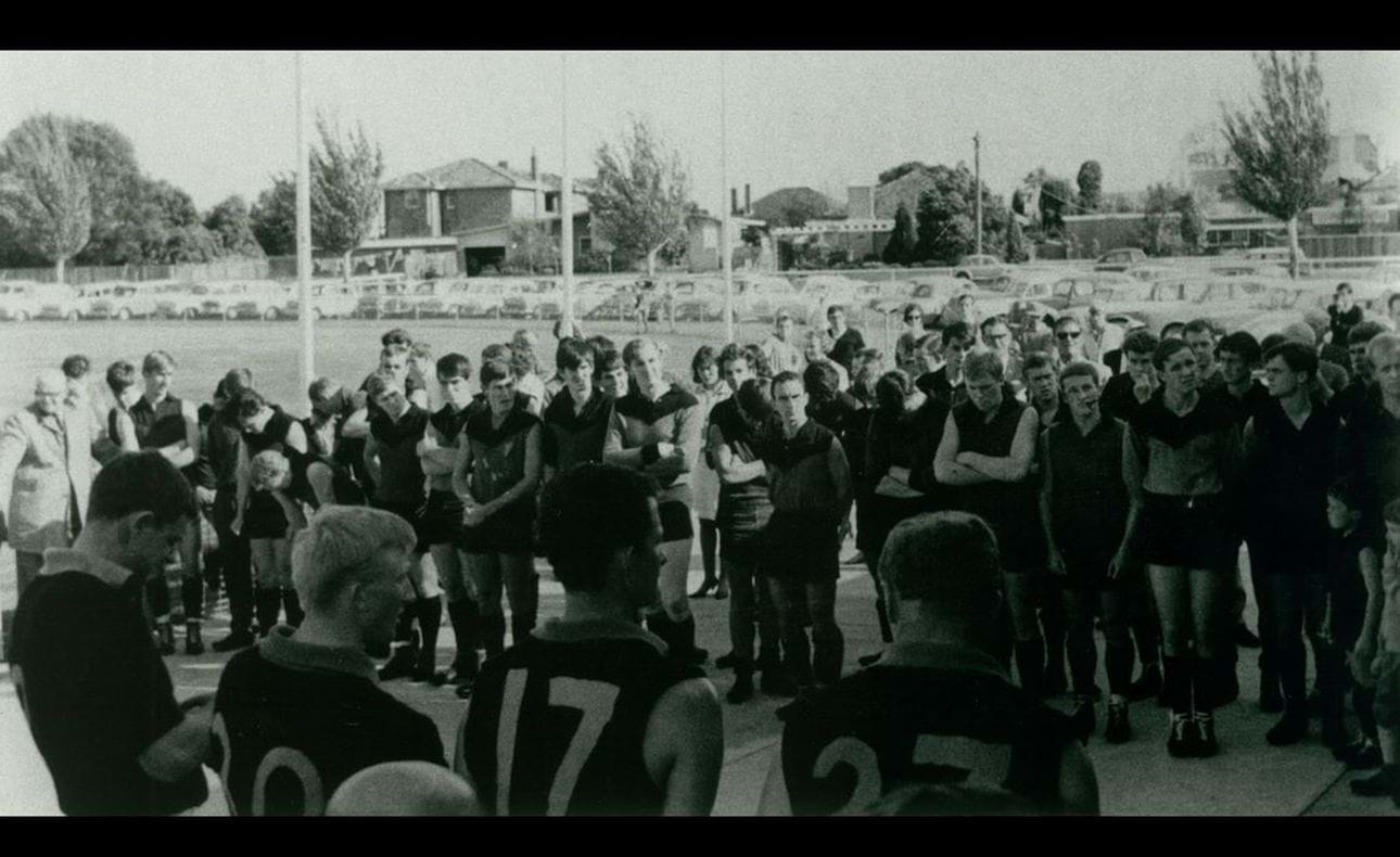 Team at flag unfurling