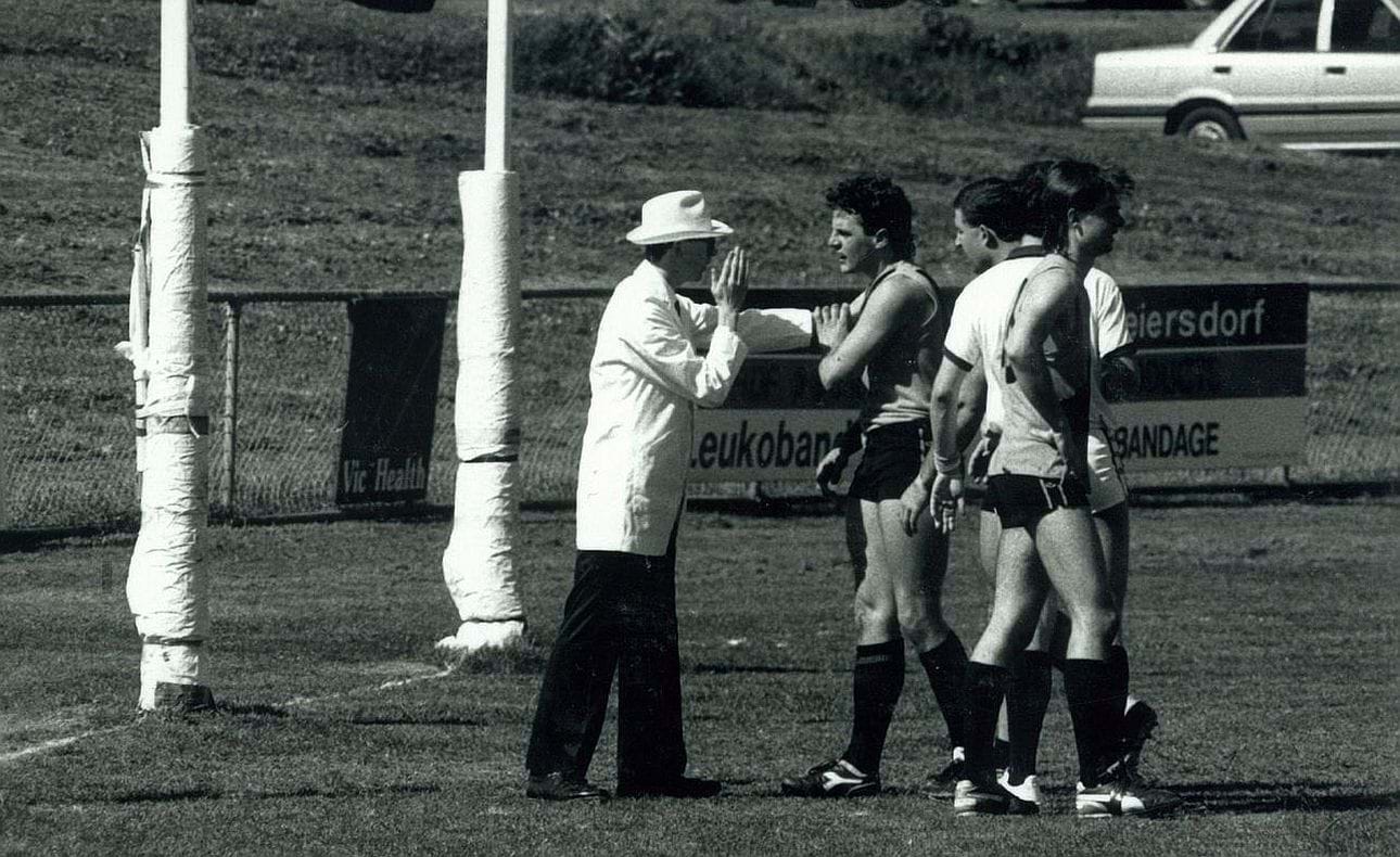 Goal umpire and Preston defender in debate