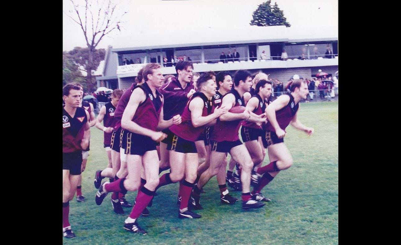The Bloods look like they mean business in their warm-up prior to the 1995 Grand Final at Elsternwick Park.