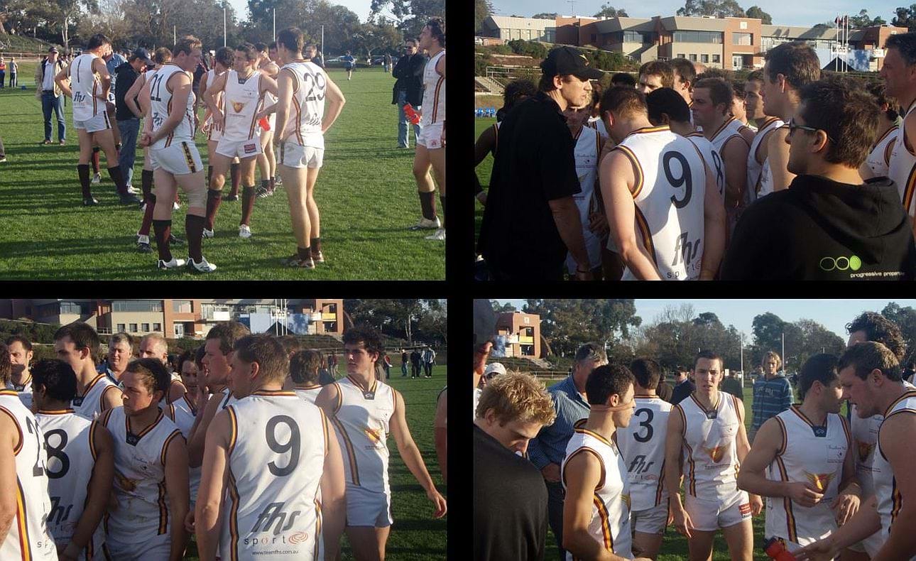 Wearing away “clash” jumpers for the first time, the Bloods listen to new coach Jamie Shanahan at Marcellin in 2008