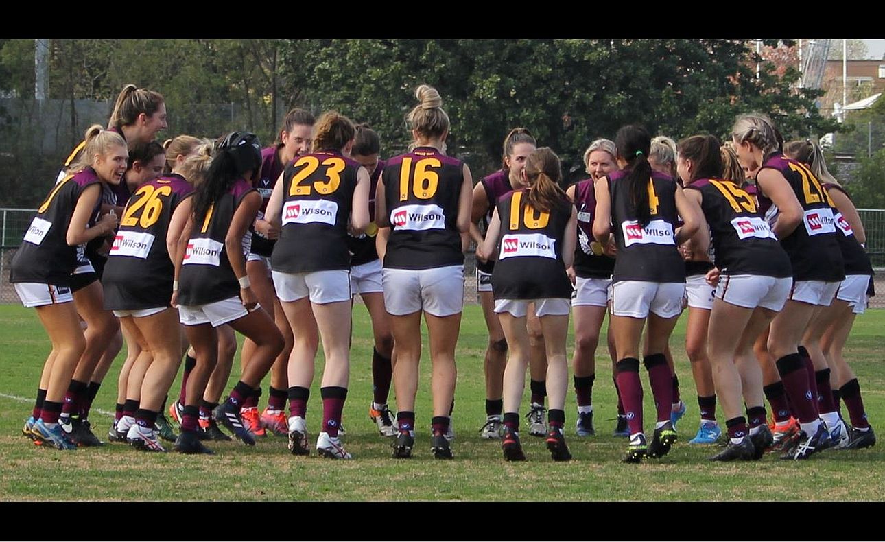 The Hearts warm up for the match against Ormond at the EE Gunn Reserve, Round 7