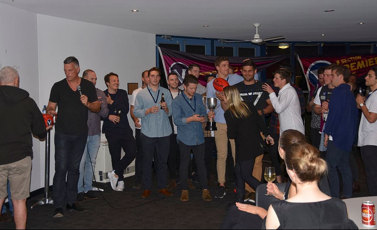 Premiership celebrations at Princes Park led by Mark Seccull (with microphone) following the 2017 Grand Final win