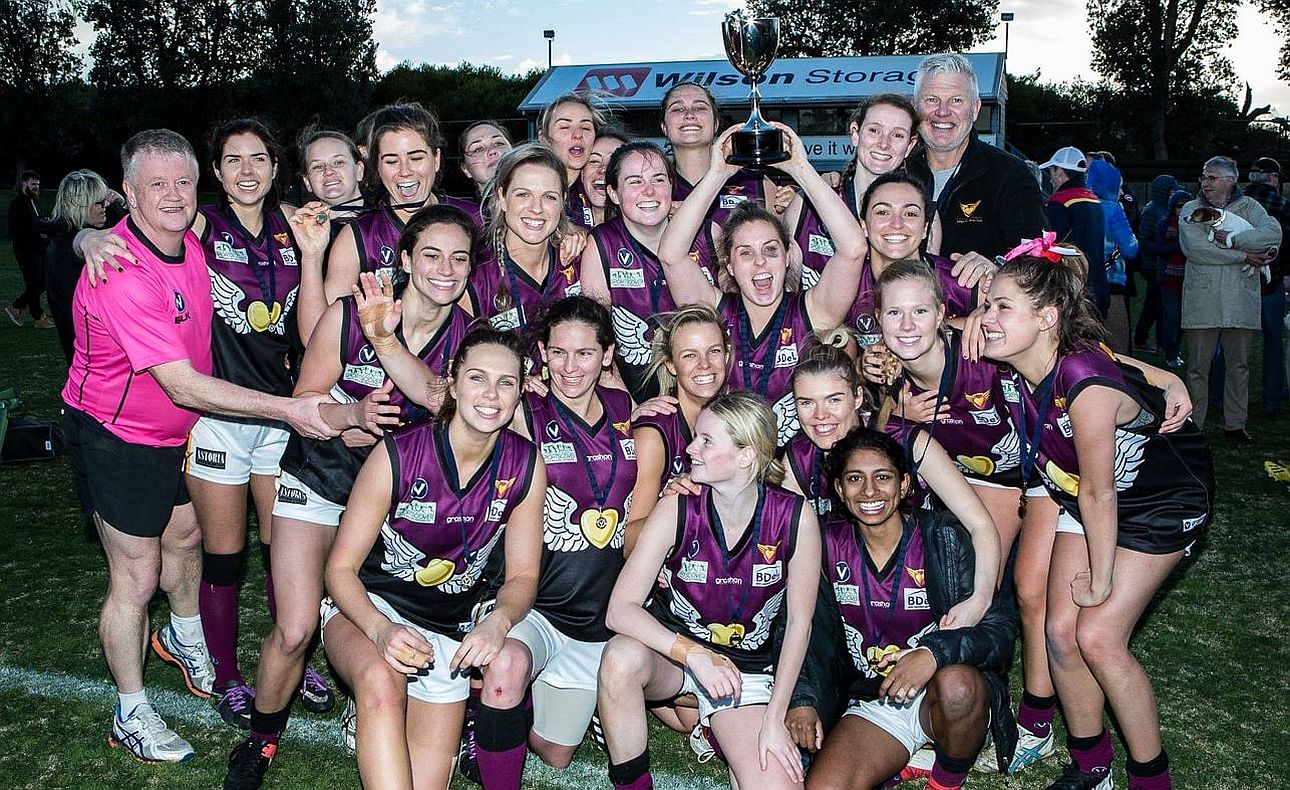 The Hearts celebrate their premiership at Trevor Barker Oval in only their second year