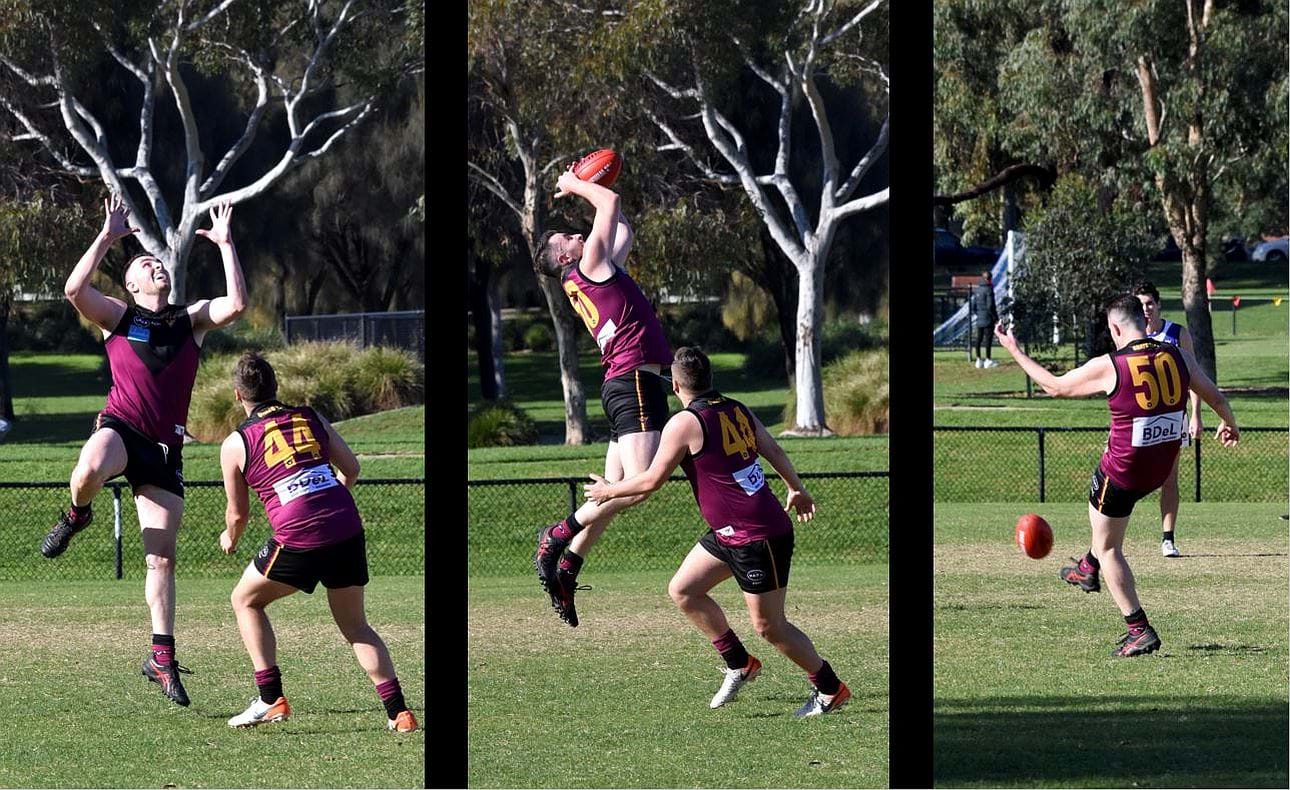 Jacob Gown (50) marks and kicks for goal, Ben Oakes (44) awaits the crumbs that never came