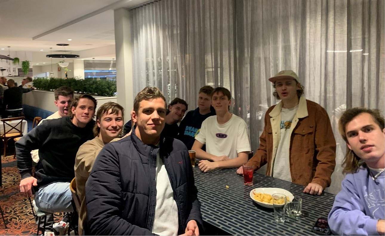 It wasn't just the past players who enjoyed the night; current players including Lachie Treverton and Castan Racunica in the foreground celebrate their comprehensive win earllier in the day over St Bede's Mentone Tigers